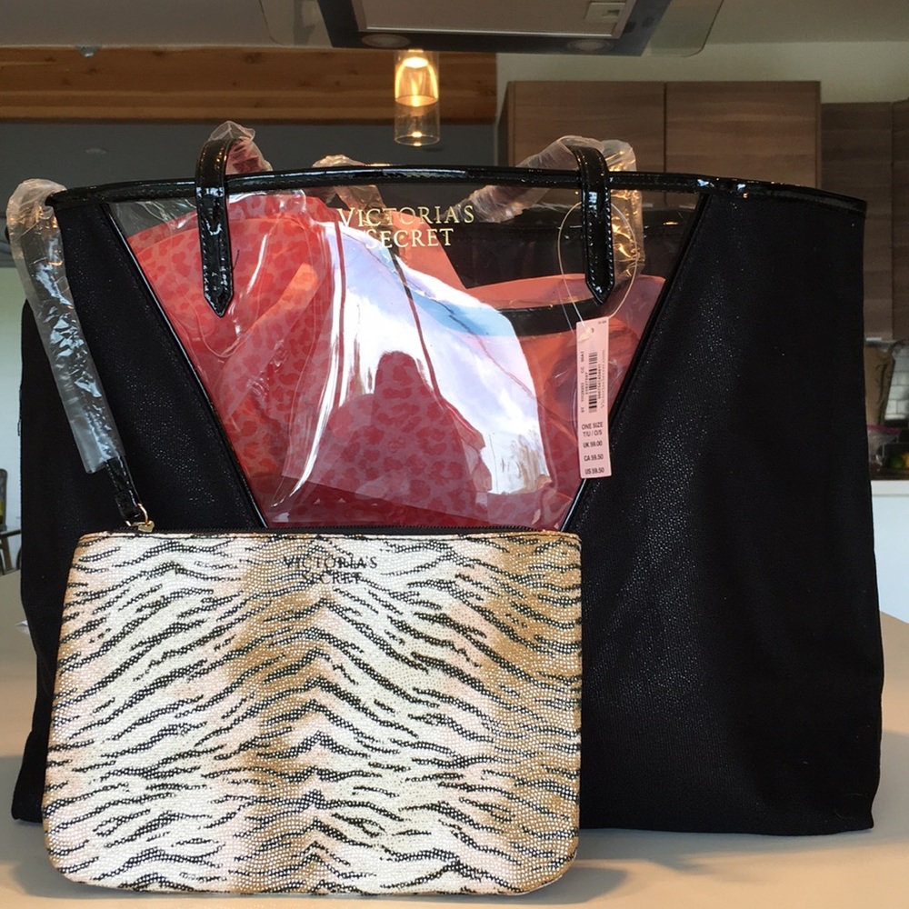 Large black tote with makeup bag! Clear bag